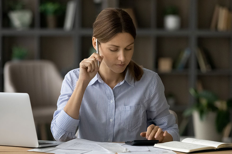 a young professional is preparing the financial books